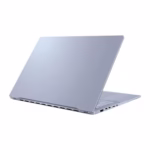 Vivobook S16 closed-lid rear three-quarter view showing slim Mist Blue aluminium chassis and ASUS Vivobook branding